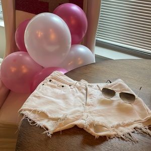 White distressed Levi shorts